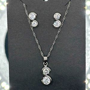 Brilliant cut Moissanite diamonds set in sterling silver S settings